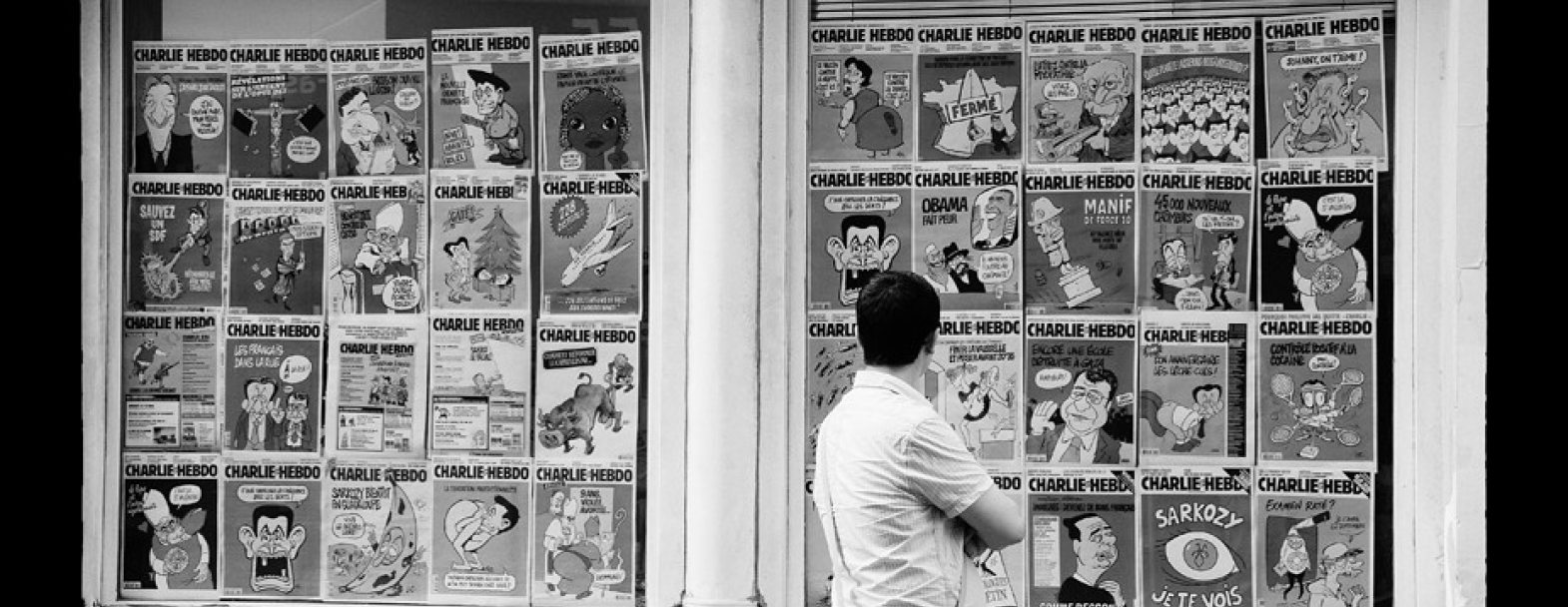 Vitrine de la rédaction de «Charlie Hebdo», prise avant l'incendie de leur précédent local. Vitrine de la rédaction de «Charlie Hebdo», prise avant l'incendie de leur précédent local. / Flickr / Gongashan